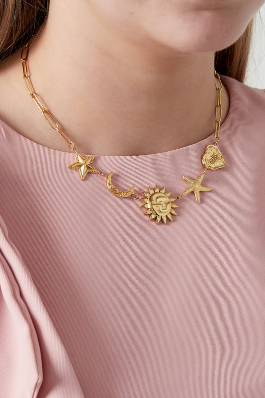Ketting met zon-, maan- en sterbedels