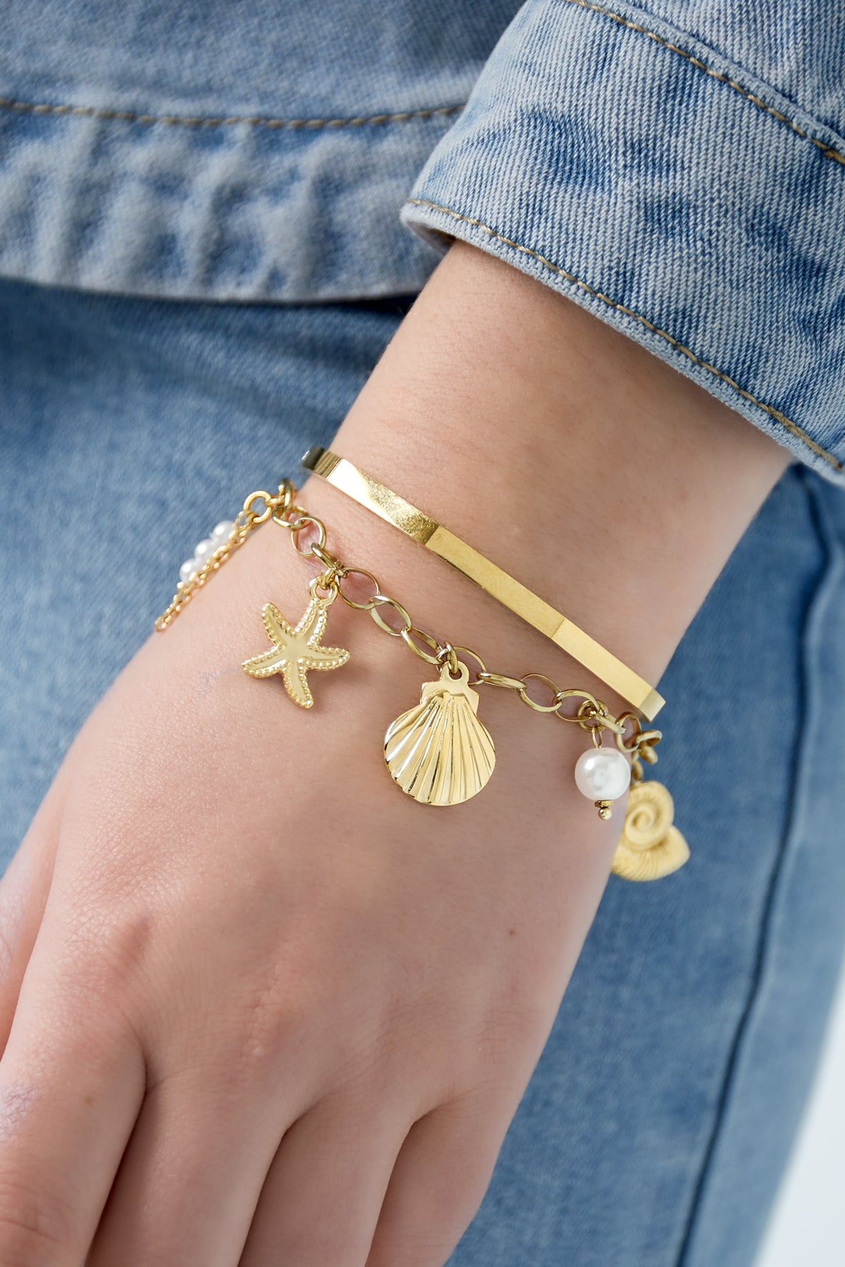 Armband met schelpen- en zeesterbedel
