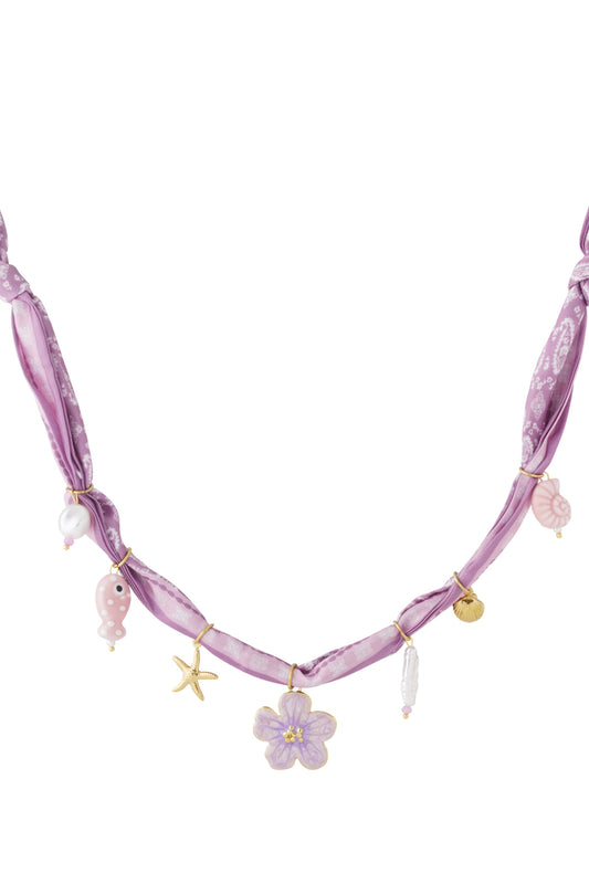 Speelse bedelketting met bloemen en schelpen