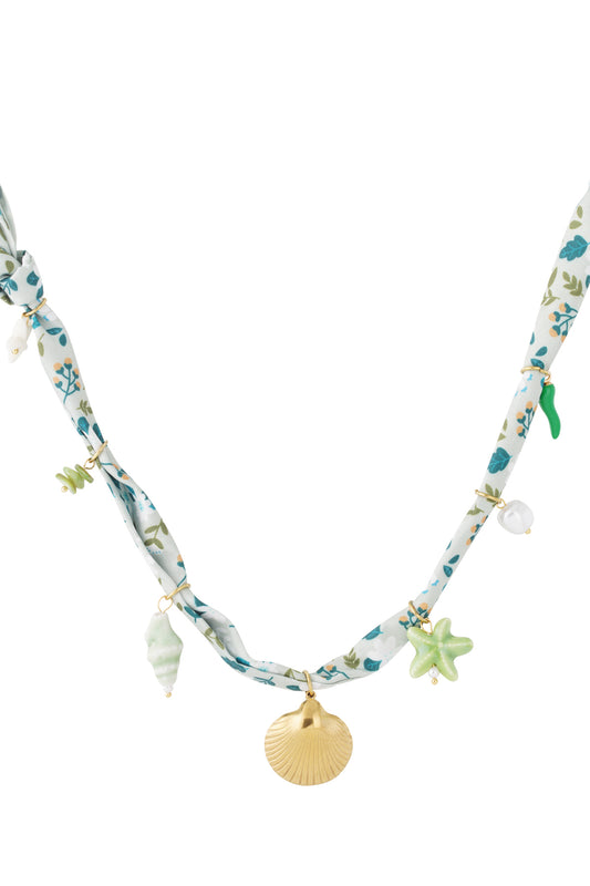 Speelse bedelketting met bloemen en schelpen